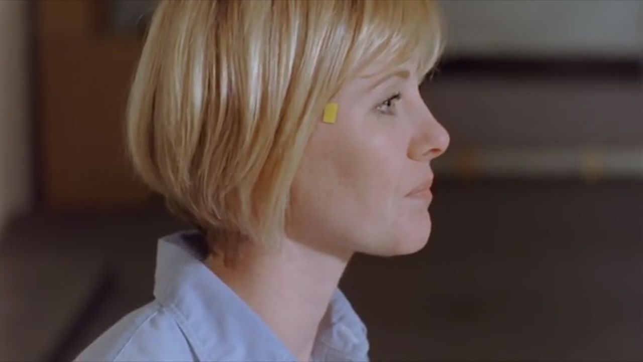 AfterLastSeasonChip The little yellow doton her temple is a "chip" that makes mind-sharing possible.